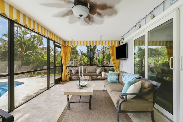 10174 Dogwood Ave, Palm Beach Gardens, FL 33410 - sunroom / solarium with a ceiling fan and an outdoor hangout area
