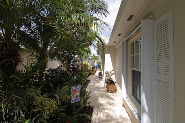 view of home's exterior with fence