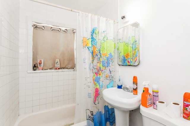 bathroom featuring toilet and shower / bathtub combination with curtain