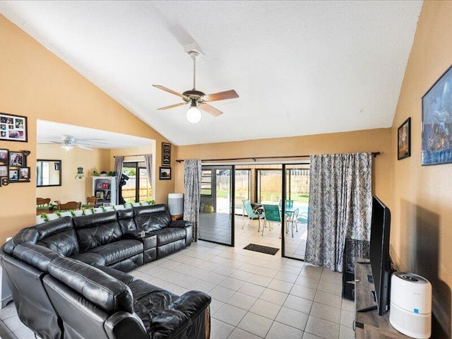 tiled living room featuring vaulted ceiling and ceiling fan