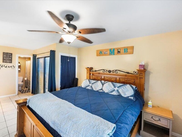 tiled bedroom featuring connected bathroom and ceiling fan