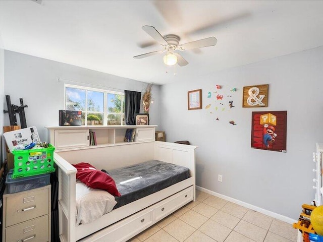 tiled bedroom with ceiling fan