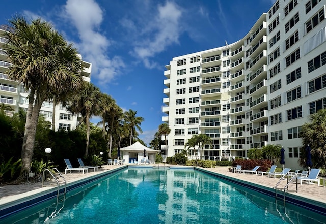 view of swimming pool featuring a patio