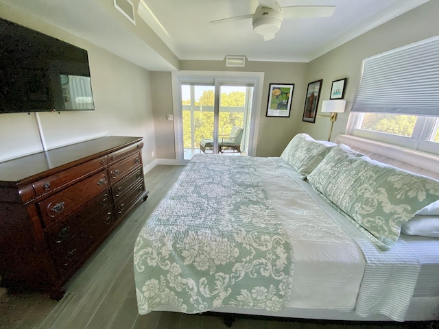 bedroom featuring multiple windows, access to outside, ceiling fan, and light hardwood / wood-style flooring