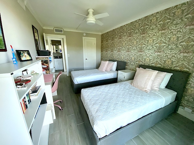 bedroom featuring hardwood / wood-style floors and ceiling fan