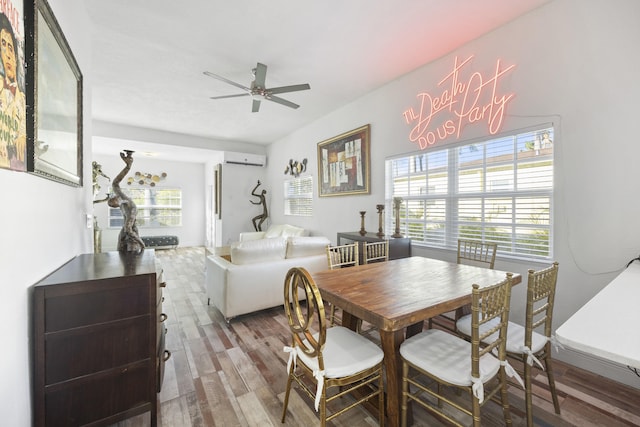 331 NW 1st Ave, Boynton Beach, FL 33435 - dining area with ceiling fan, hardwood / wood-style floors, and a wall unit AC