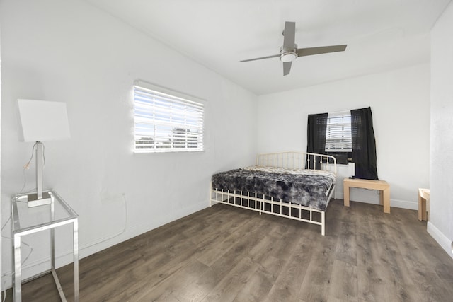 331 NW 1st Ave, Boynton Beach, FL 33435 - bedroom with ceiling fan, dark hardwood / wood-style flooring, and multiple windows