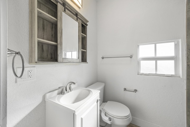 331 NW 1st Ave, Boynton Beach, FL 33435 - bathroom featuring vanity and toilet