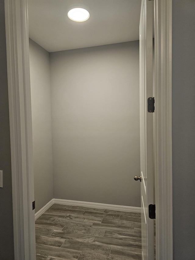 spare room featuring dark hardwood / wood-style flooring