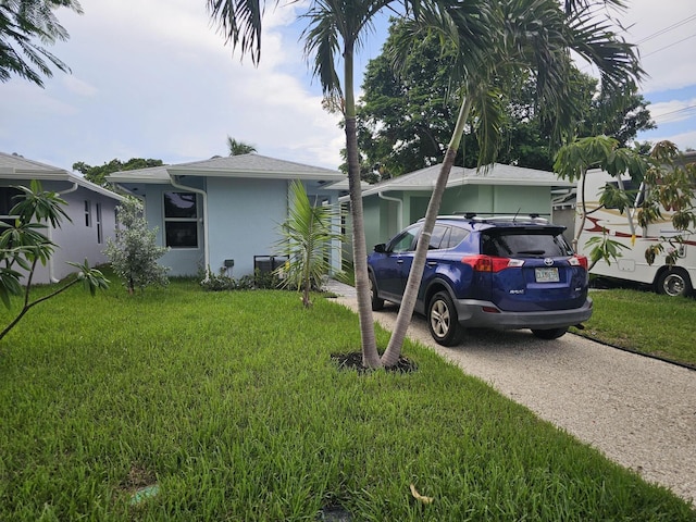 view of front of home with a front yard