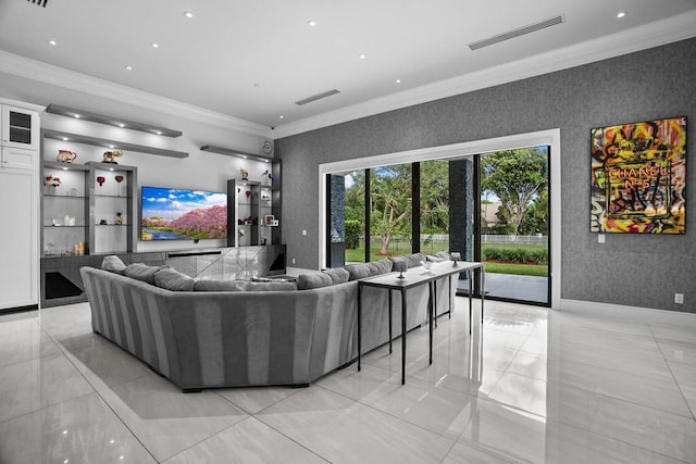 living room featuring crown molding