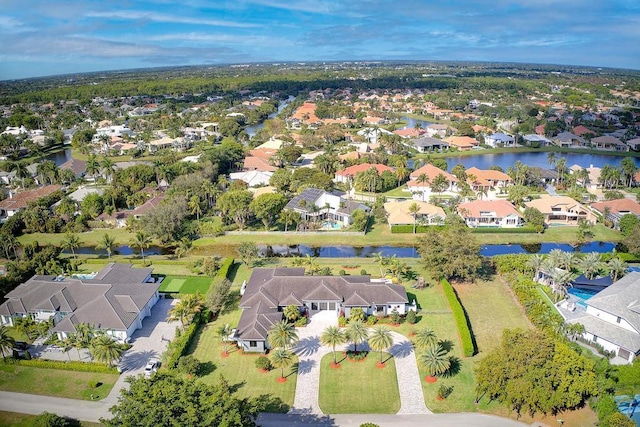 bird's eye view with a water view