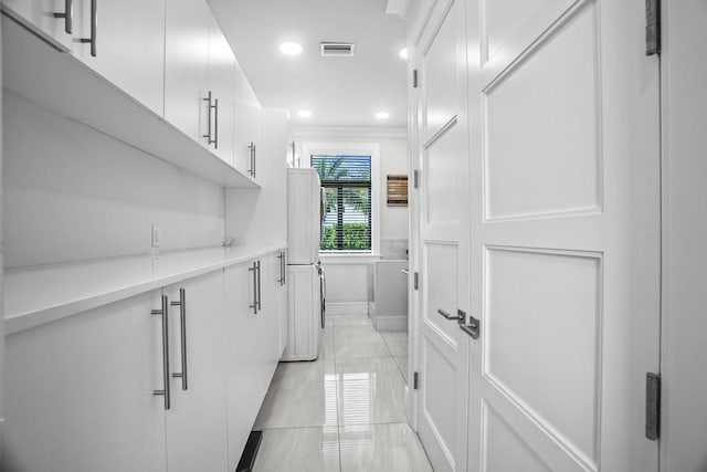 laundry room with light tile patterned floors