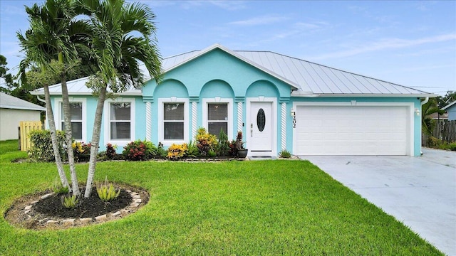 ranch-style house with a garage and a front yard