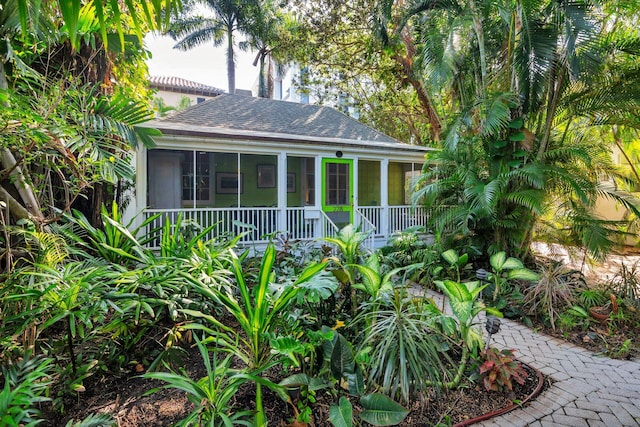 exterior space with a sunroom