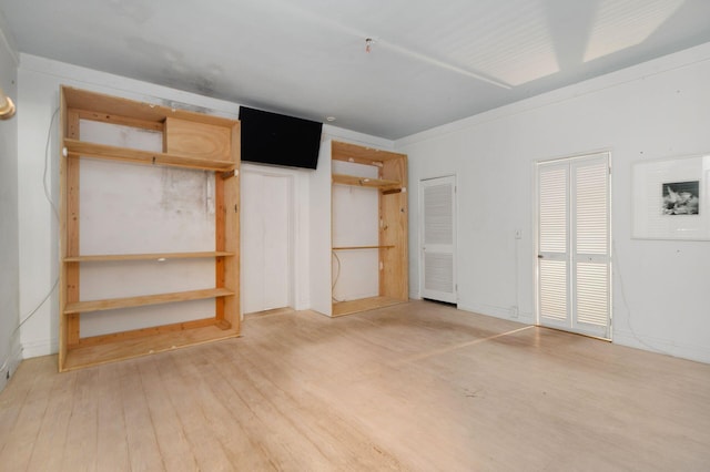 unfurnished bedroom with wood finished floors