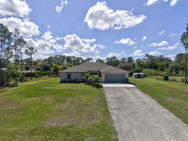 ranch-style house featuring a garage and a front lawn