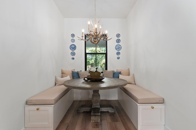 dining area with hardwood / wood-style flooring and breakfast area