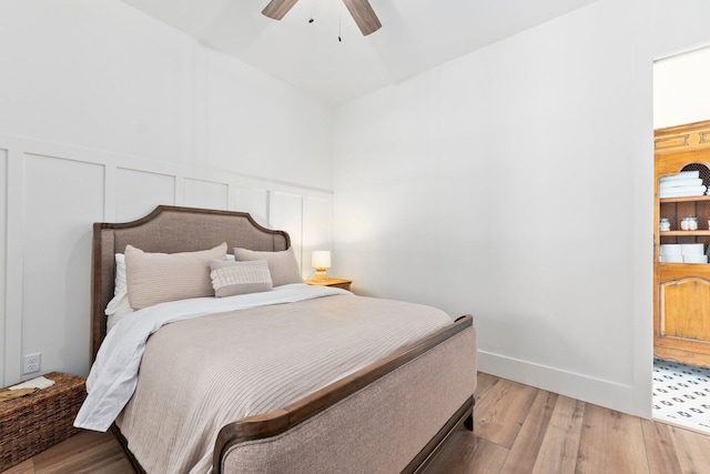 bedroom featuring ceiling fan and light hardwood / wood-style floors