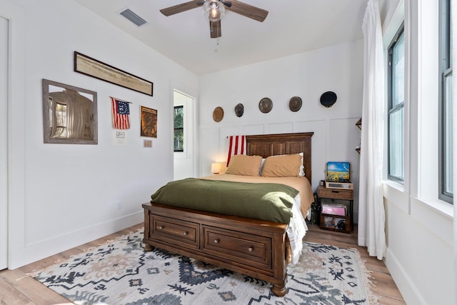 bedroom featuring ceiling fan and light hardwood / wood-style flooring