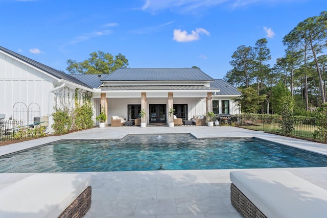 view of swimming pool featuring a patio area