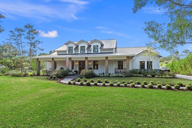 view of front of home featuring a front lawn and a porch