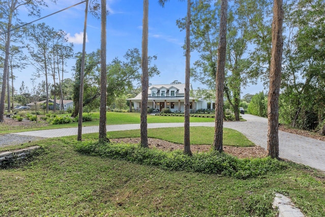 exterior space featuring a front yard