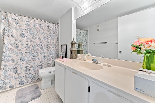6065 Pointe Regal Cir Unit 307, Delray Beach, FL 33484 - bathroom featuring vanity, toilet, tile patterned floors, and curtained shower