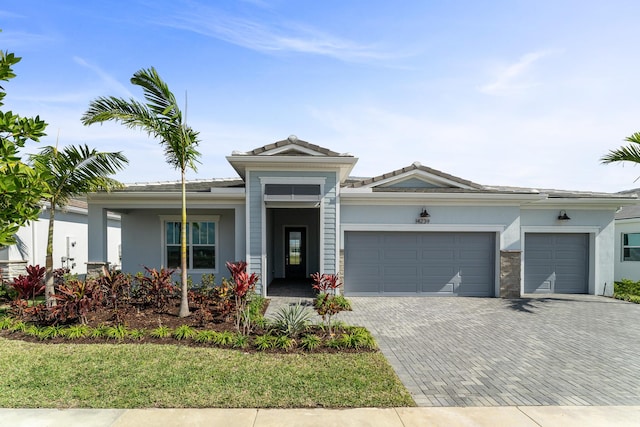 view of front of property with a garage