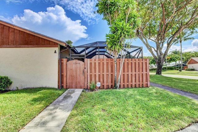 view of yard featuring a lanai