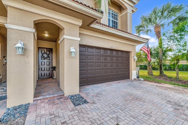 property entrance with a garage