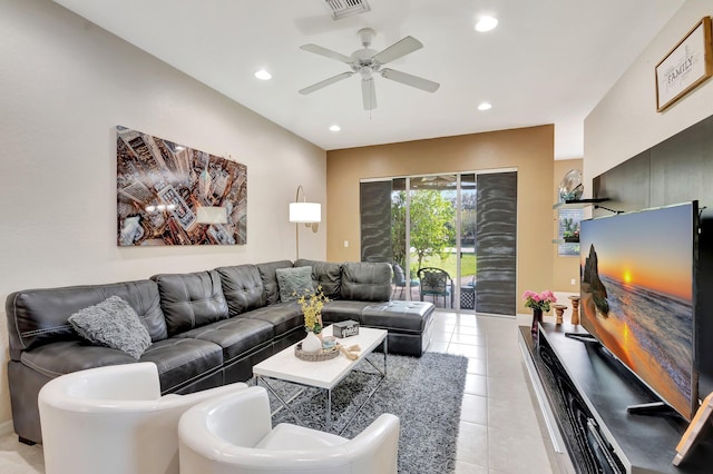 living room featuring ceiling fan and light tile patterned floors