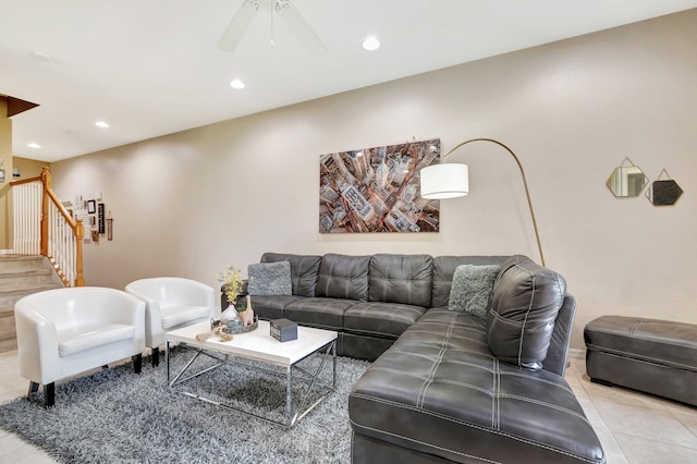 tiled living room with ceiling fan