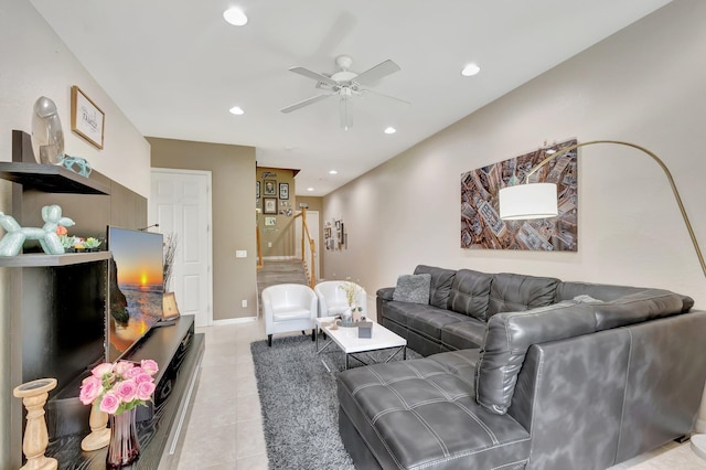 tiled living room with ceiling fan