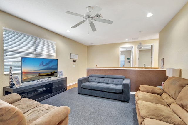 living room featuring ceiling fan