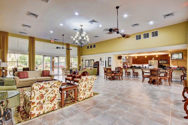 tiled living room with a high ceiling