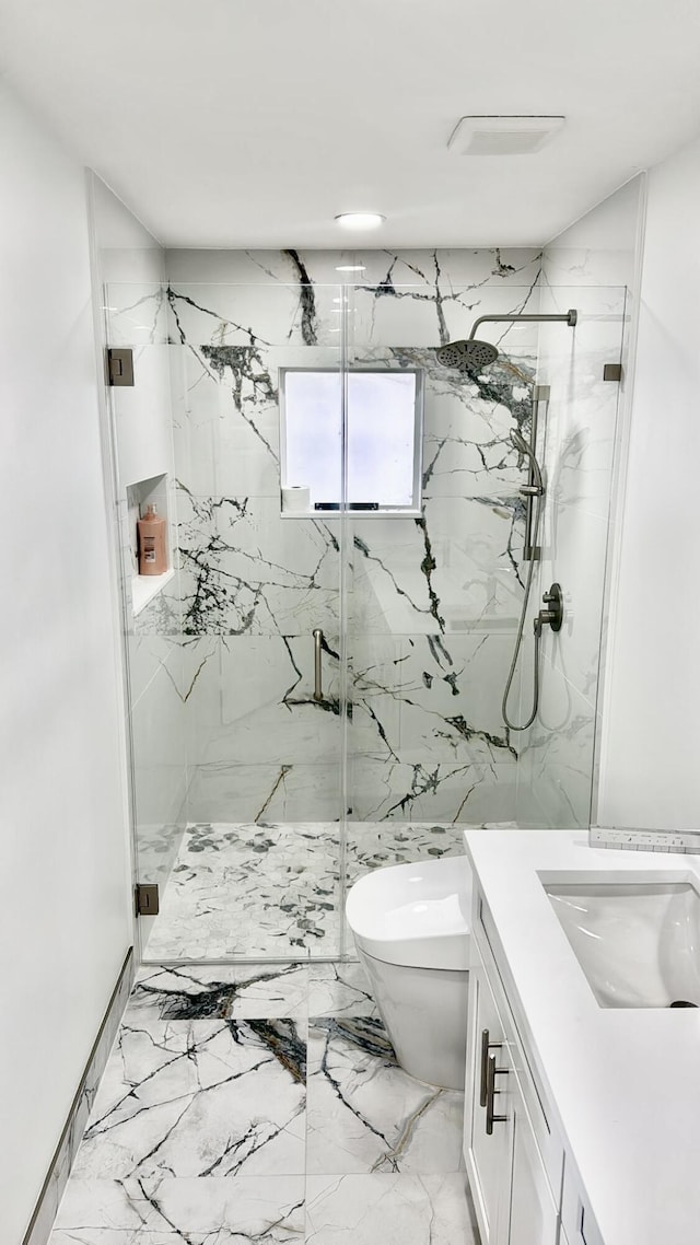 1001 Cape Cod Ter, Greenacres, FL 33413 - full bathroom featuring a marble finish shower and toilet