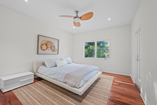 bedroom featuring ceiling fan and wood-type flooring