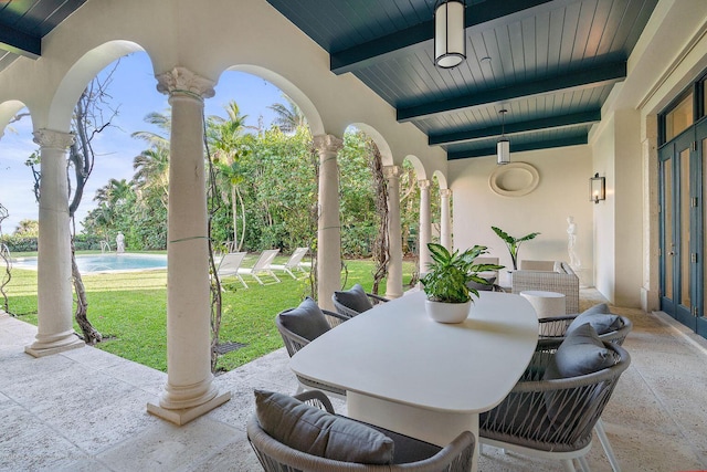 view of patio / terrace featuring a water view