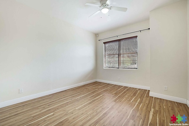 empty room with ceiling fan and light wood-type flooring