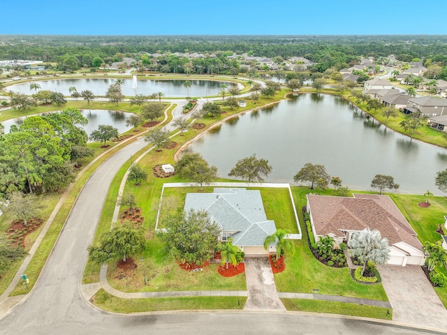 aerial view with a residential view and a water view