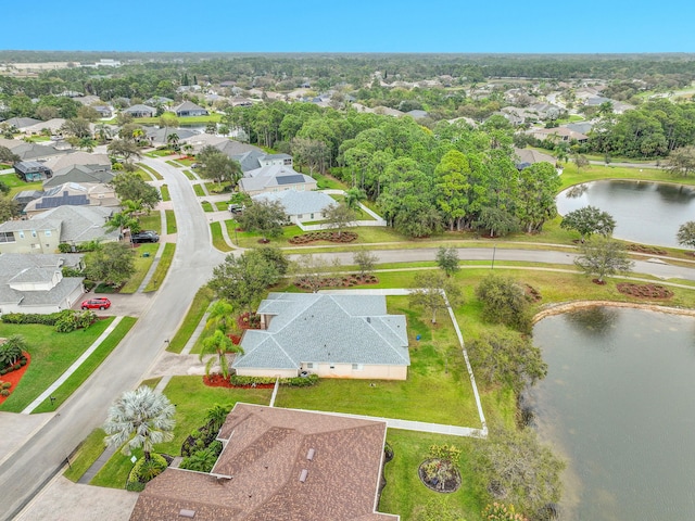 aerial view featuring a residential view and a water view