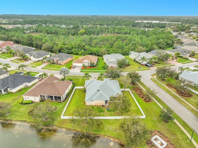 aerial view featuring a water view and a residential view