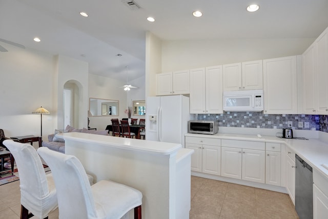 kitchen featuring white cabinetry, appliances with stainless steel finishes, light tile patterned floors, and ceiling fan