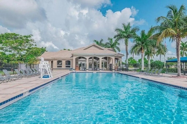 view of pool featuring a patio area