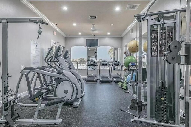 exercise room with ornamental molding