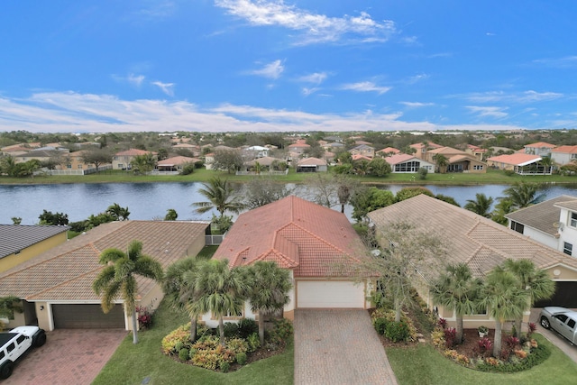 bird's eye view with a water view