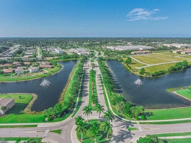 drone / aerial view with a water view