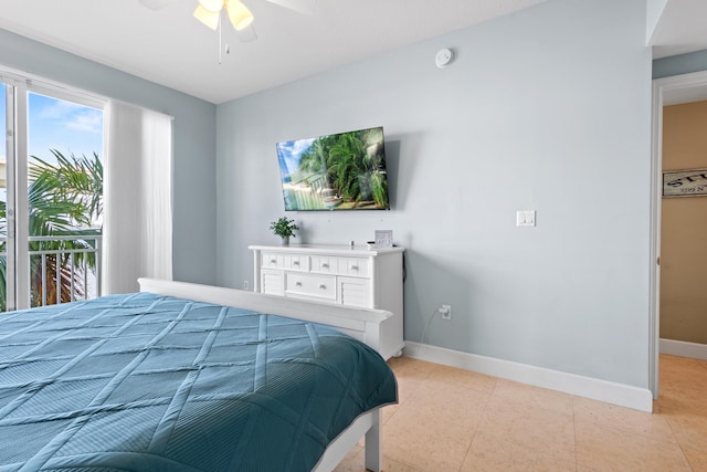 bedroom featuring light tile patterned flooring, ceiling fan, and baseboards