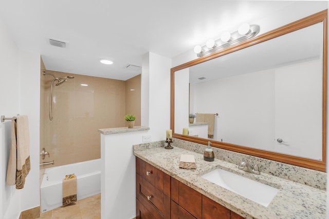 bathroom with tile patterned flooring, vanity, and shower / bathing tub combination